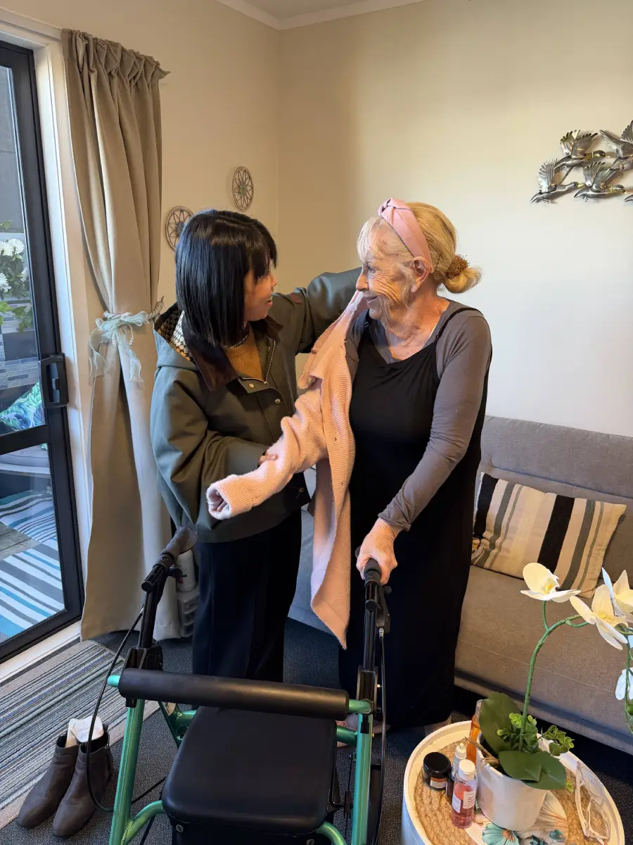 Haven Care caregiver assisting client at home